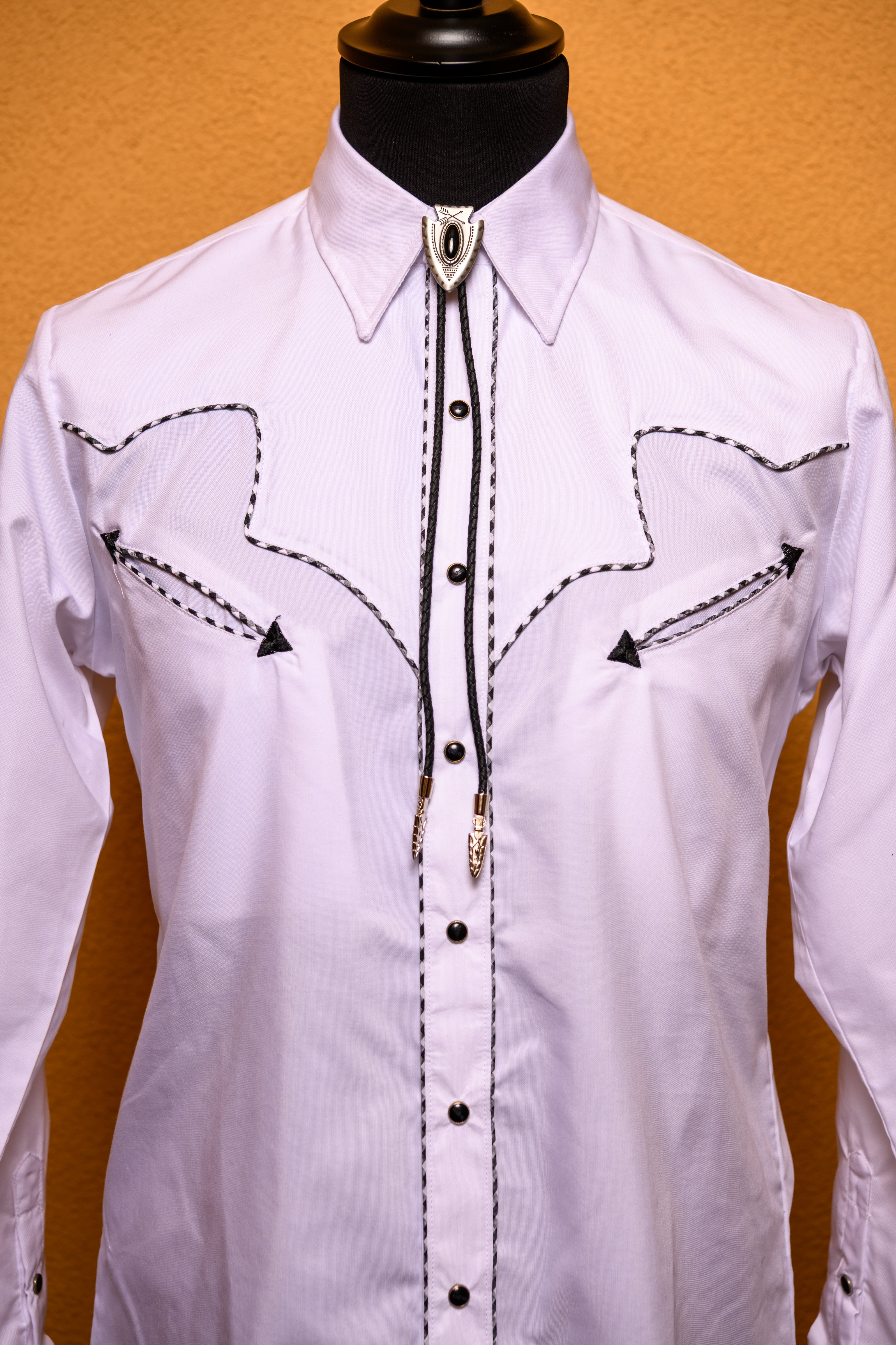 Western bolo tie with the initial S