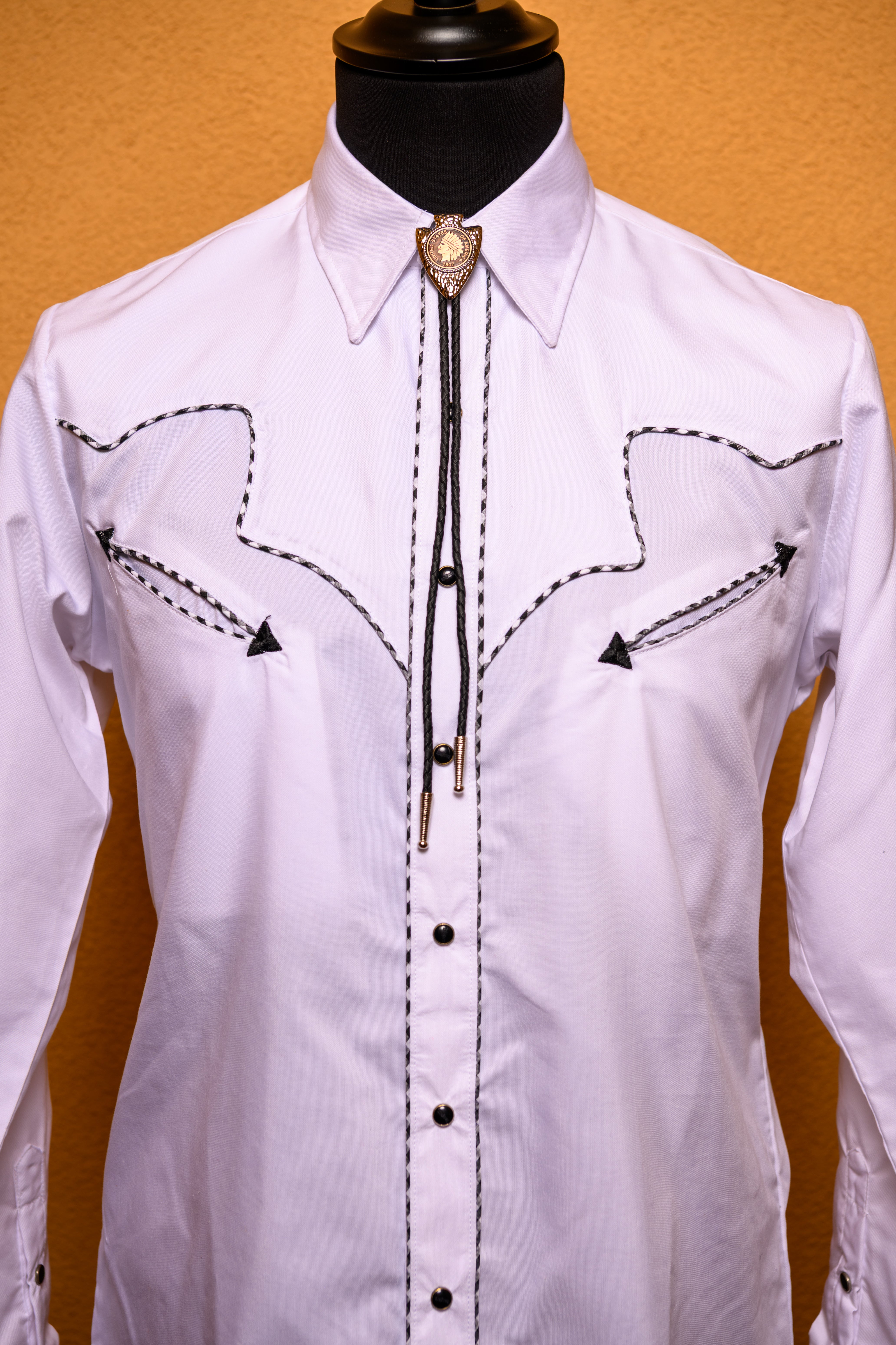 Western bolo tie with the initial S