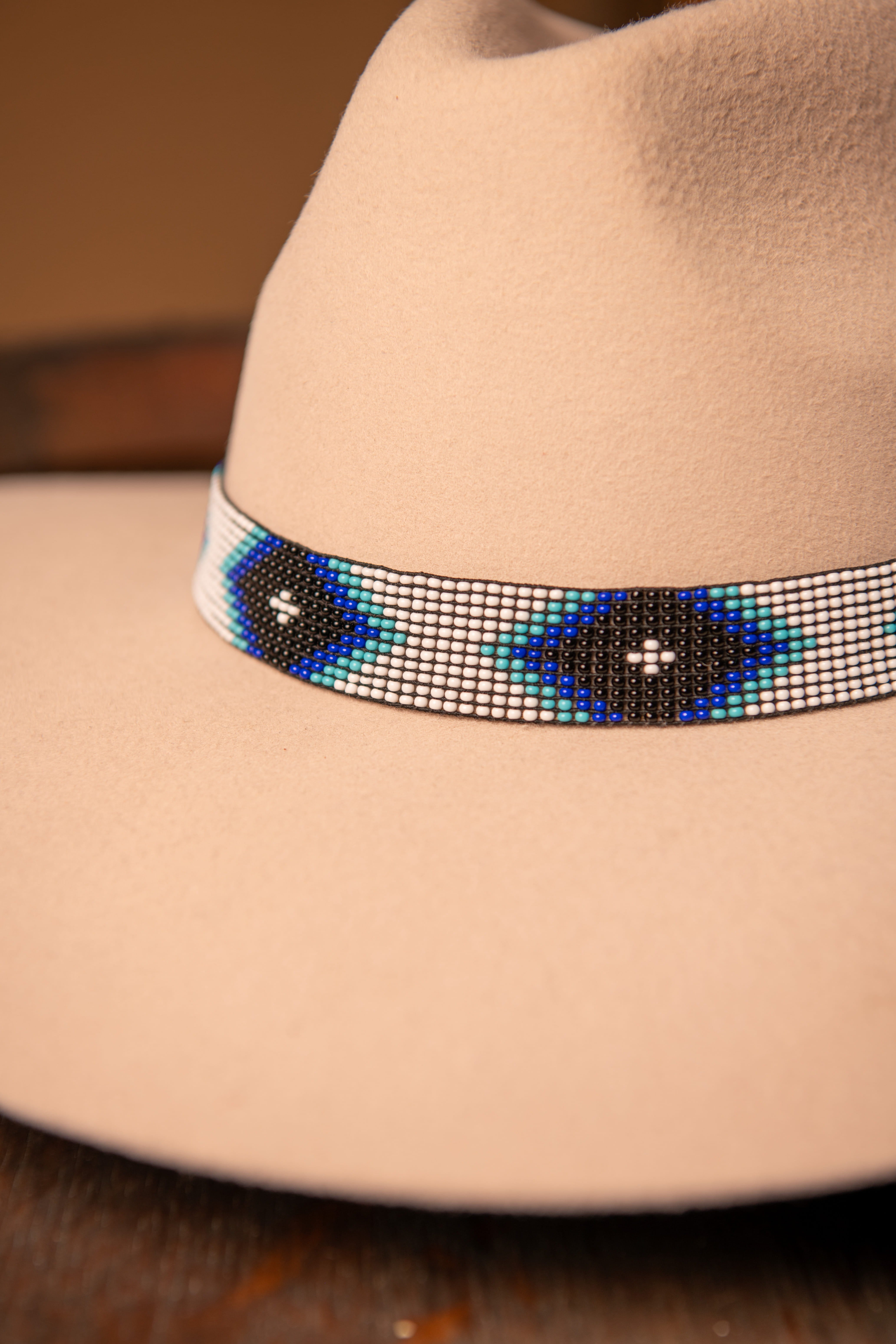 Bone hat band with black beads