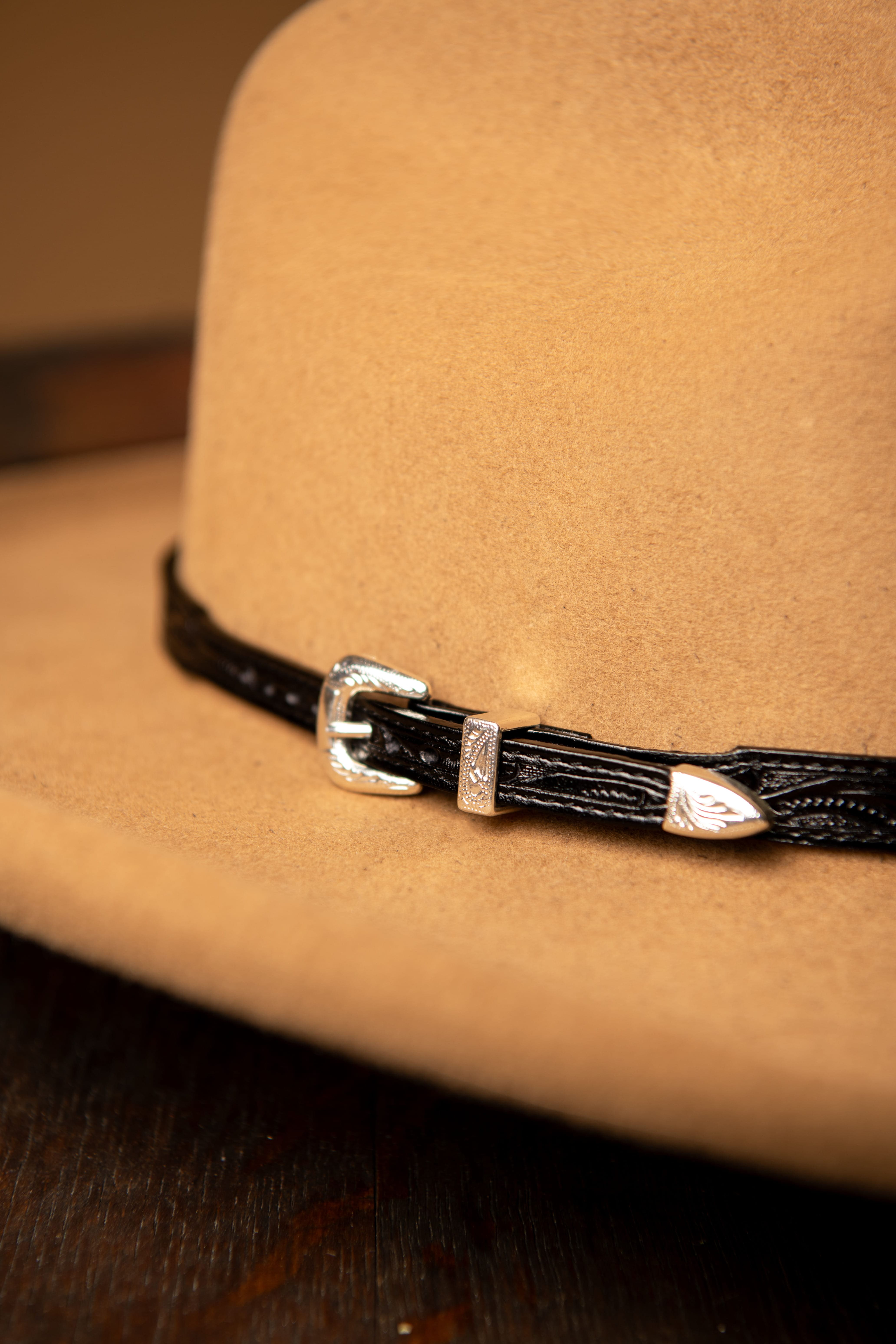 Bone hat band with black beads